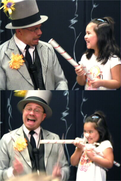 Helper having fun with Doug Hoover at his magic show!