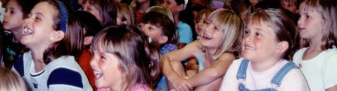 Happy kids at Doug's magic show in Southern California